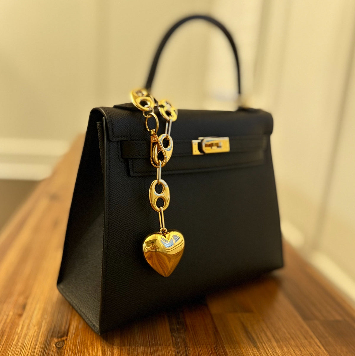 The Horsebit Heart Charm