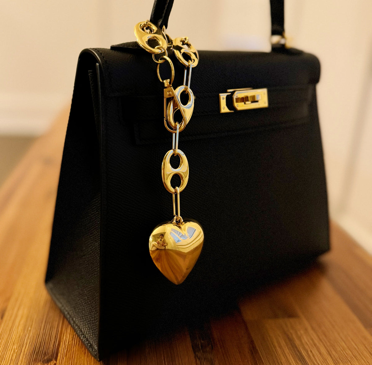 The Horsebit Heart Charm